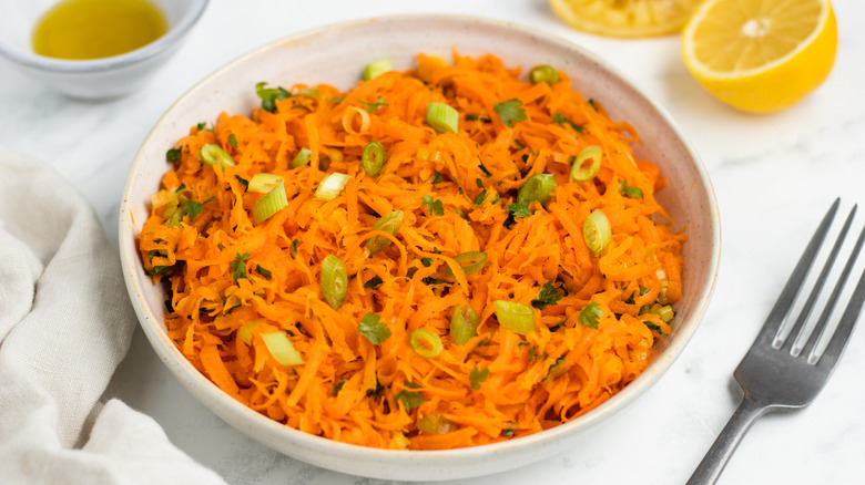 shredded carrot salad in bowl 