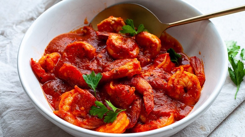 shrimp with red sauce in bowl