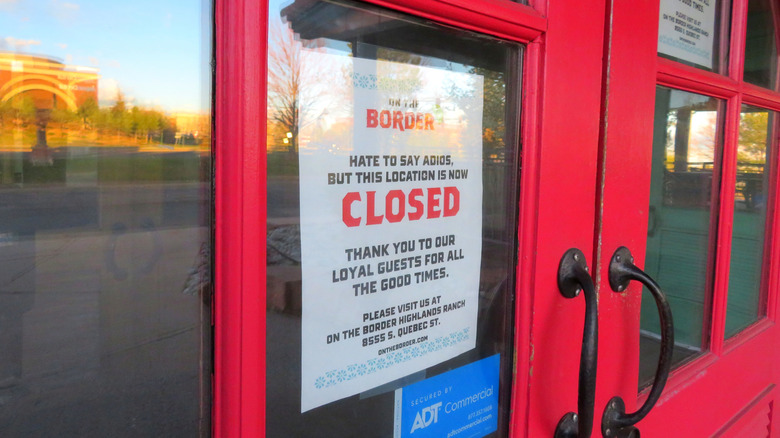 Closed sign on the door of an On The Border restaurant
