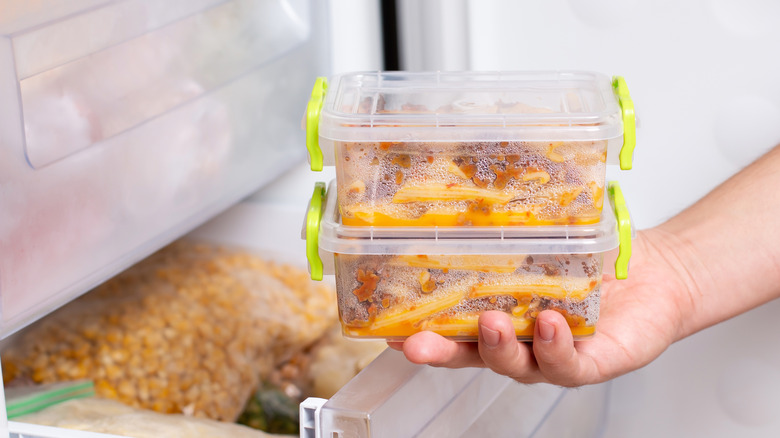 open fridge/freezer full of fruits and vegetables