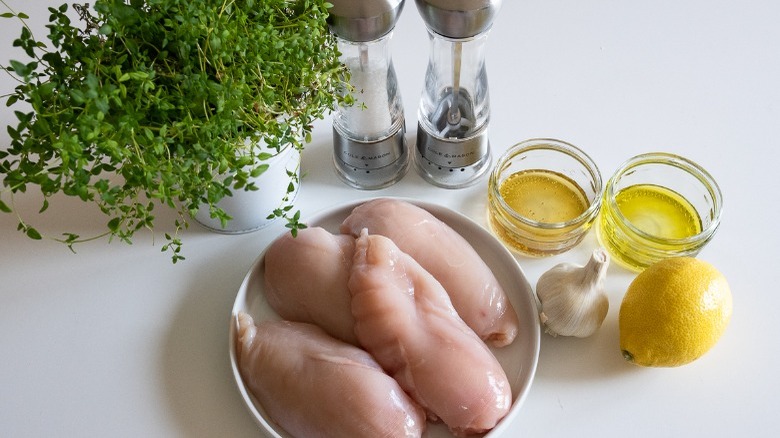 raw chicken breast and seasonings
