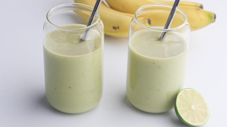 smoothies in glasses with straws