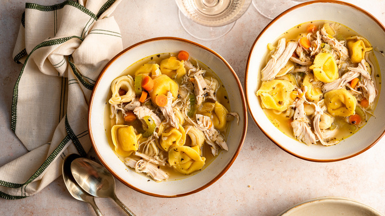 tortellini soup in bowls
