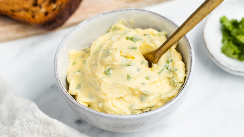 white bowl of herbed butter