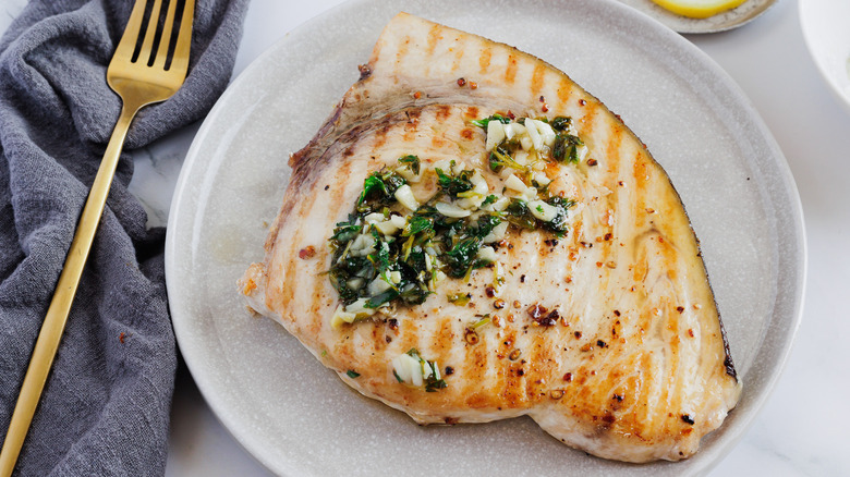 grilled swordfish on plate 