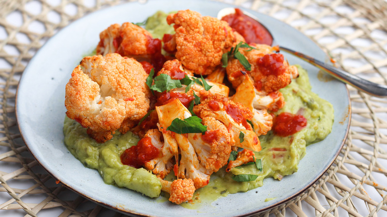 Cauliflower with guacamole on a plate