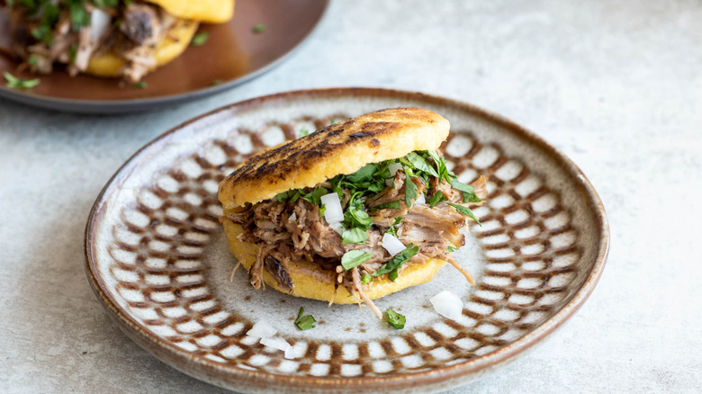 arepas with pulled pork filling