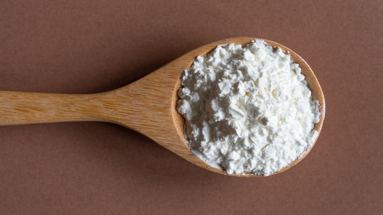Cornstarch on a wooden spoon