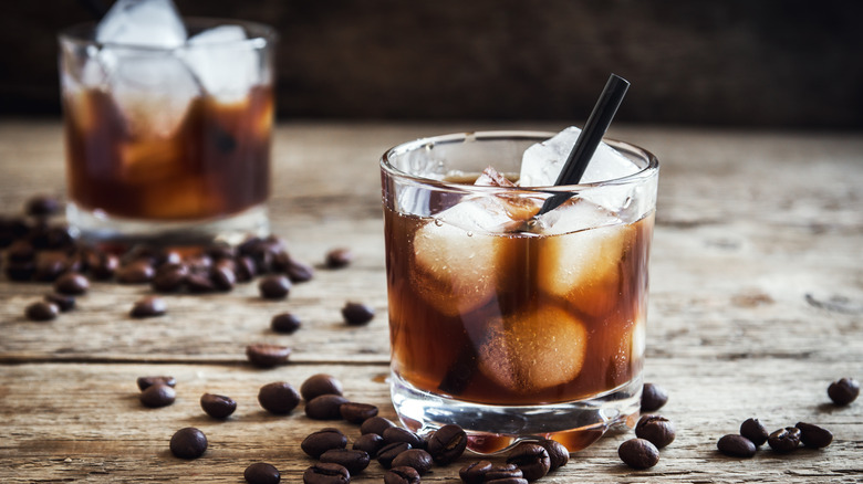 coffee cocktail in whiskey glass with straw