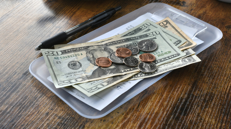 cash on restaurant table