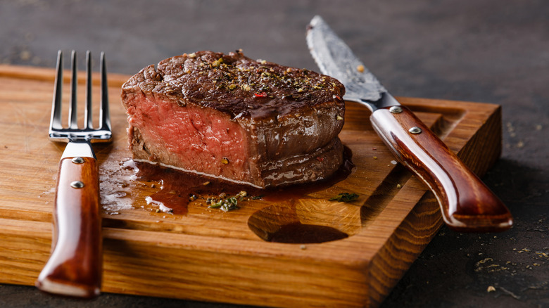 filet mignon on cutting board