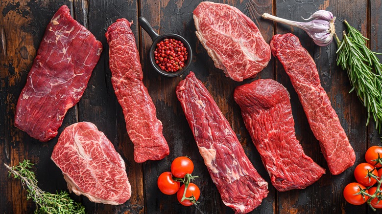 various cuts of raw steak