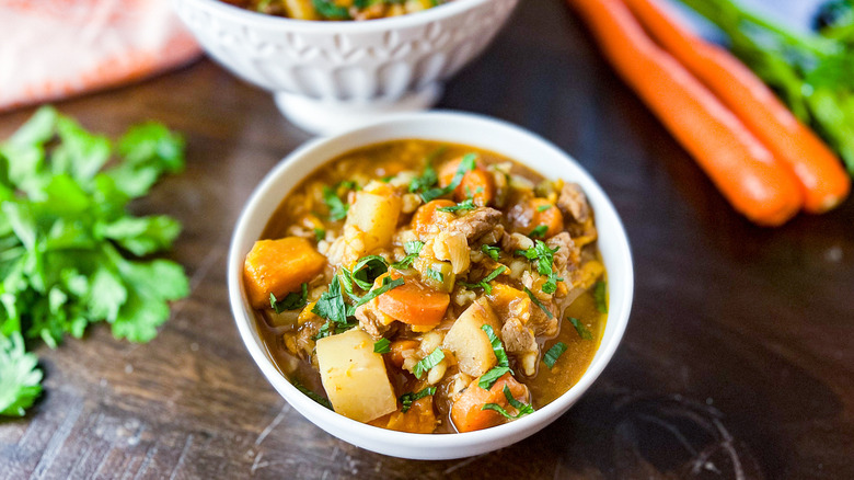 Beef barley soup in bowls