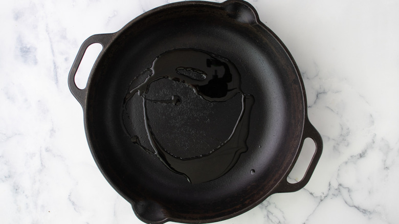 oil heating in cast iron skillet