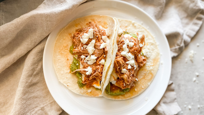 Slow Cooker Cochinita Pibil served on tortillas