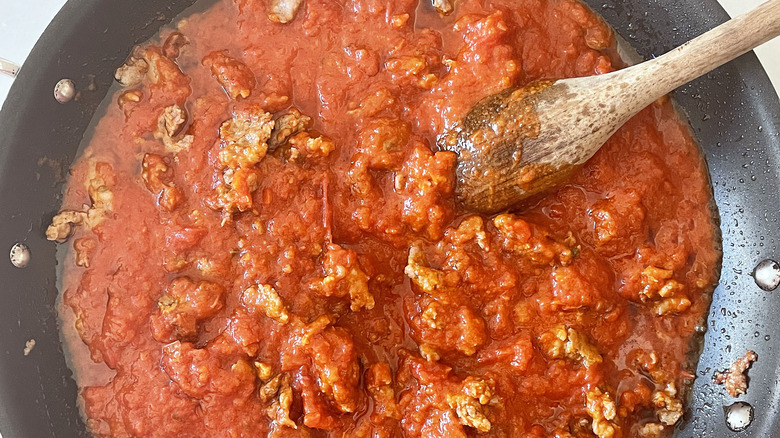 marinara sauce and sausages broken up