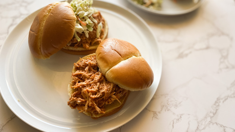 Slow Cooker Pulled Chicken served on sandwiches