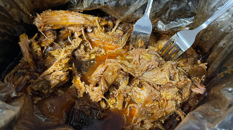 Shredded pork with two forks