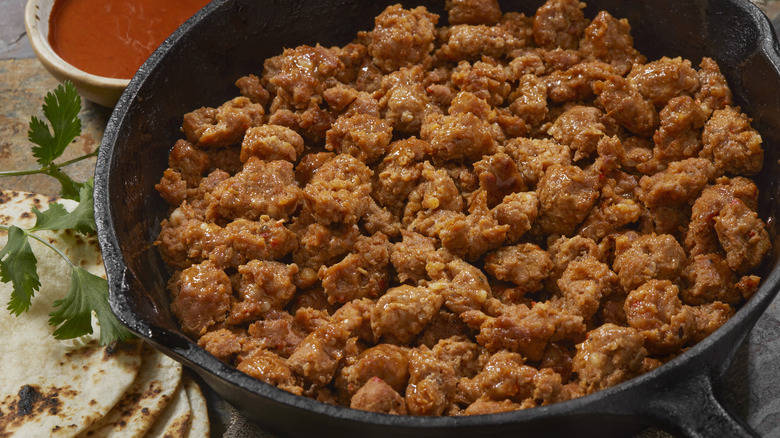 cast iron skillet filled with chorizo