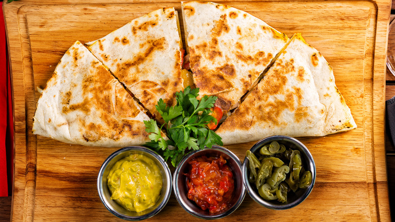 quesadilla on cutting board