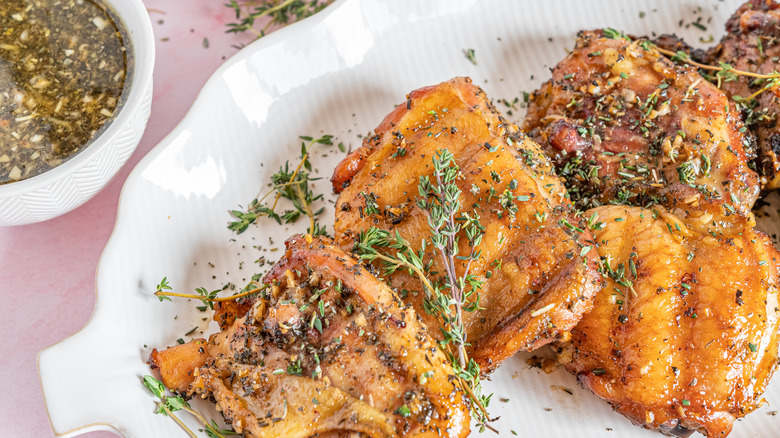 rosemary garnished smoked chicken thighs