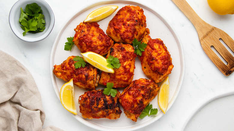 harissa chicken thighs on plate