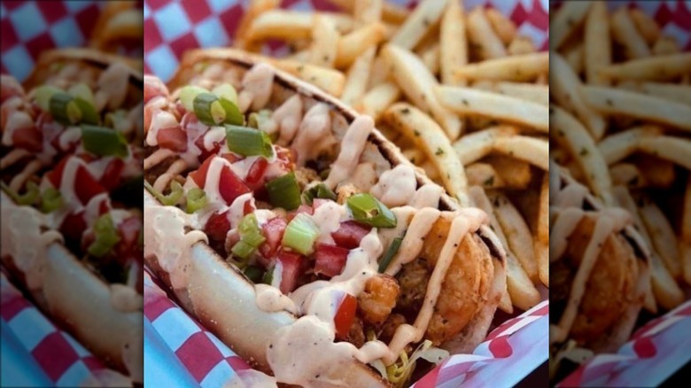 Fried shrimp sandwich and french fries from Trap Kitchen
