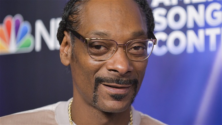 Snoop Dogg smirking at camera
