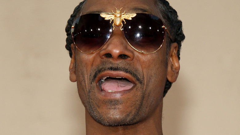 Snoop Dogg holding mouth open