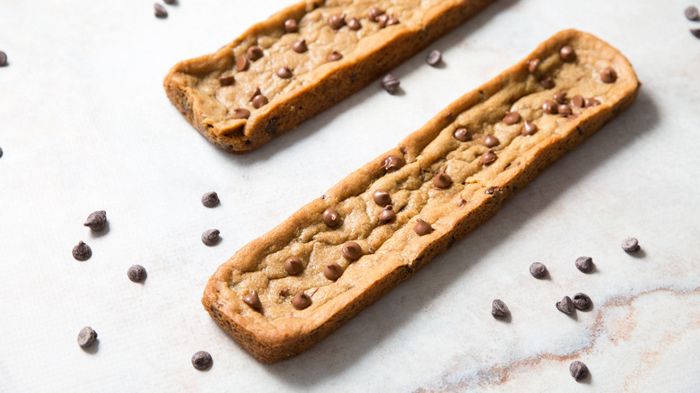 copycat Subway footlong cookies on white background surrounded by chocolate chips