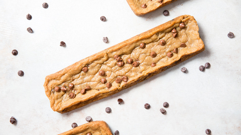 copycat Subway Footlong cookies on white background surrounded by chocolate chips