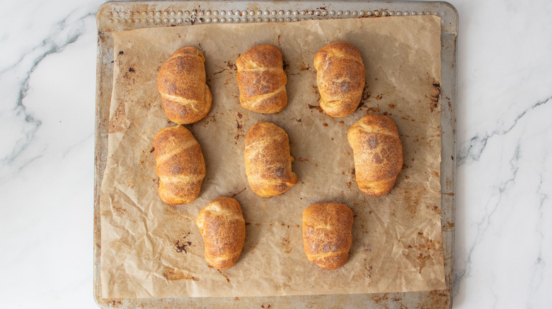 Baked crescent rolls on baking sheet