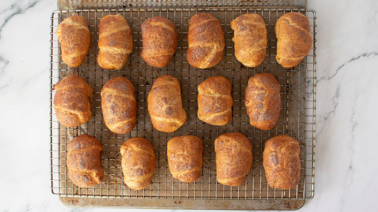 Baked crescent rolls on wire rack