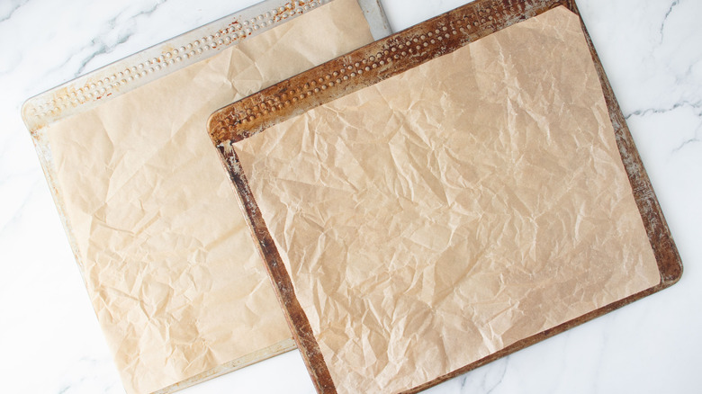 Cookie sheets lined with parchment paper