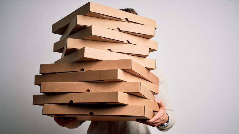 stacks of delivered pizza boxes