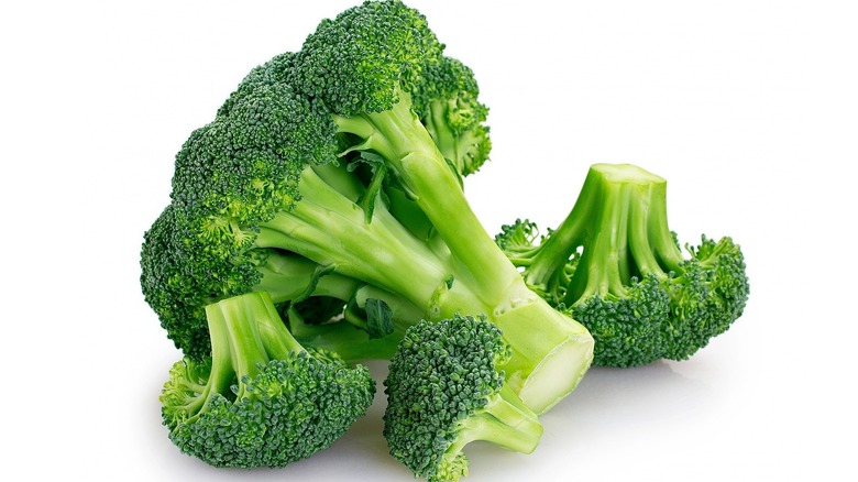 broccoli florets on white background