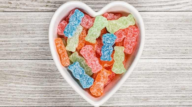 Heart-shaped bowl of Sour Patch Kids