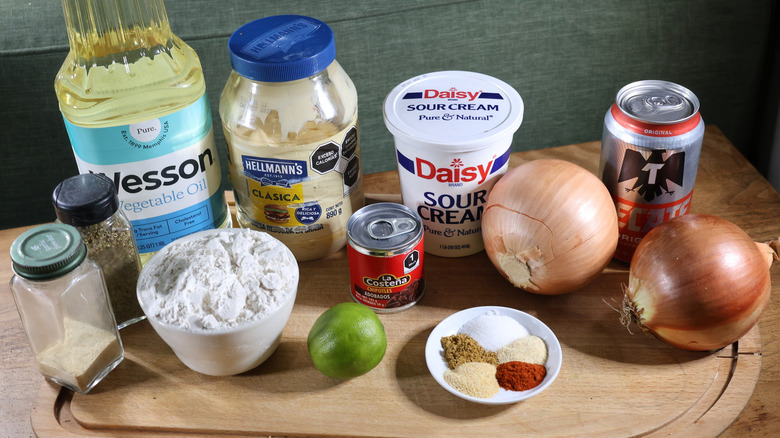 Southwestern beer battered onion rings ingredients laid out on cutting board