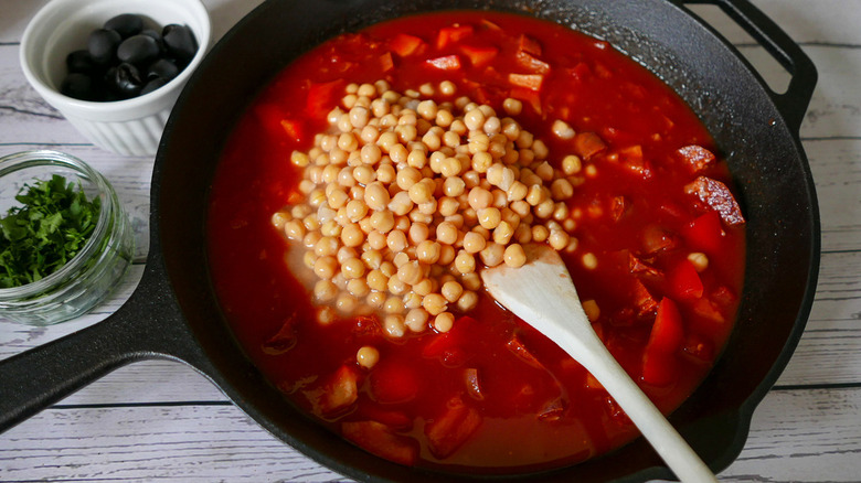 chickpeas and tomatoes in pan