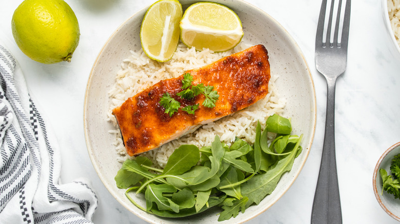 spicy baked salmon in bowl 