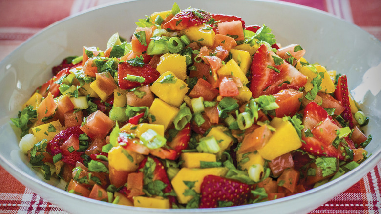Strawberry and mango salsa in a bowl.