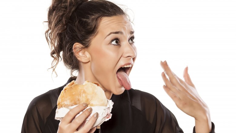 woman eating spicy food