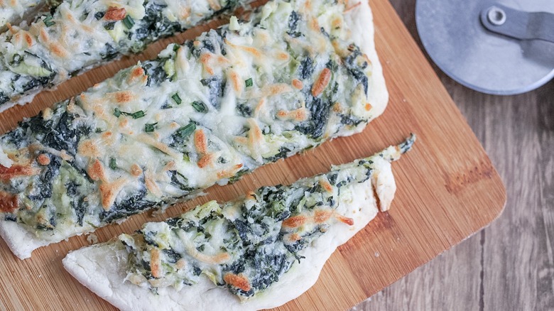 spinach and artichoke flatbread sliced