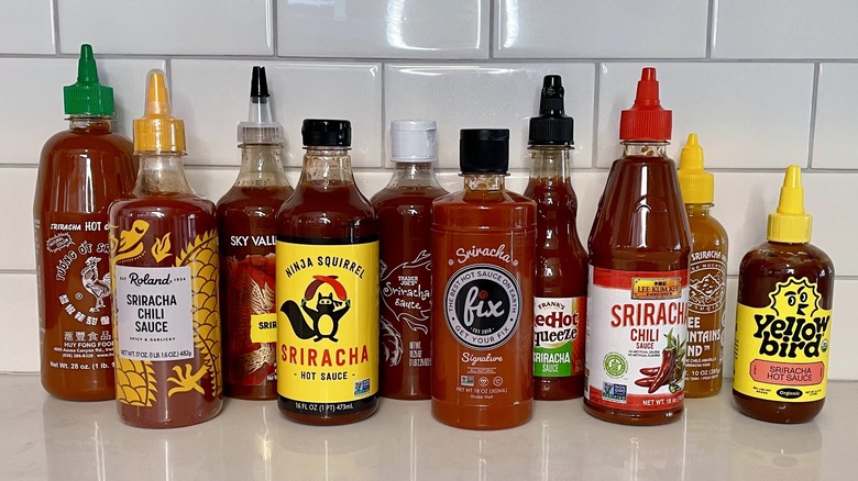 Sriracha bottles lined up