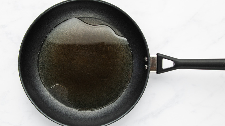 Oil heating in frying pan