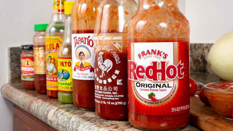 hot sauce bottles lined up