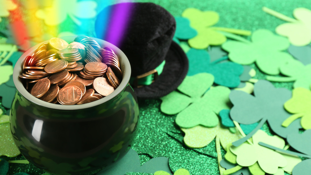 Green clovers and a pot of gold