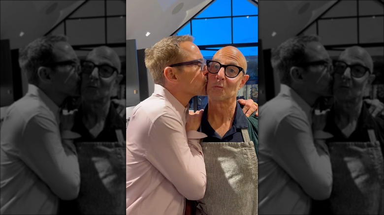Robert Downey Jr. kisses Stanley Tucci