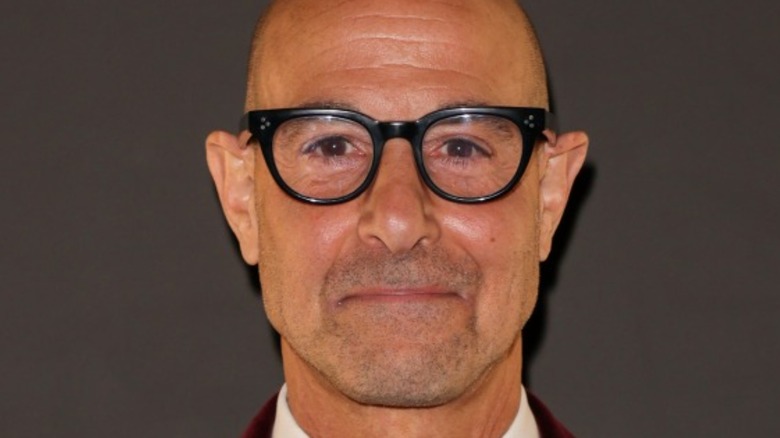 Stanley Tucci grinning