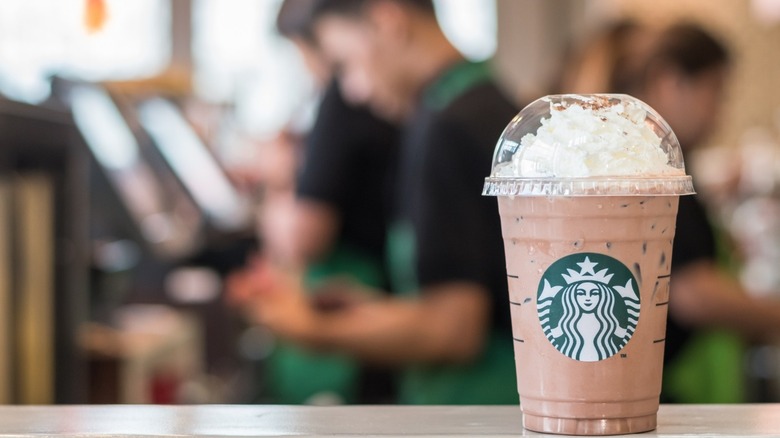 Starbucks Frappuccino on barista counter 